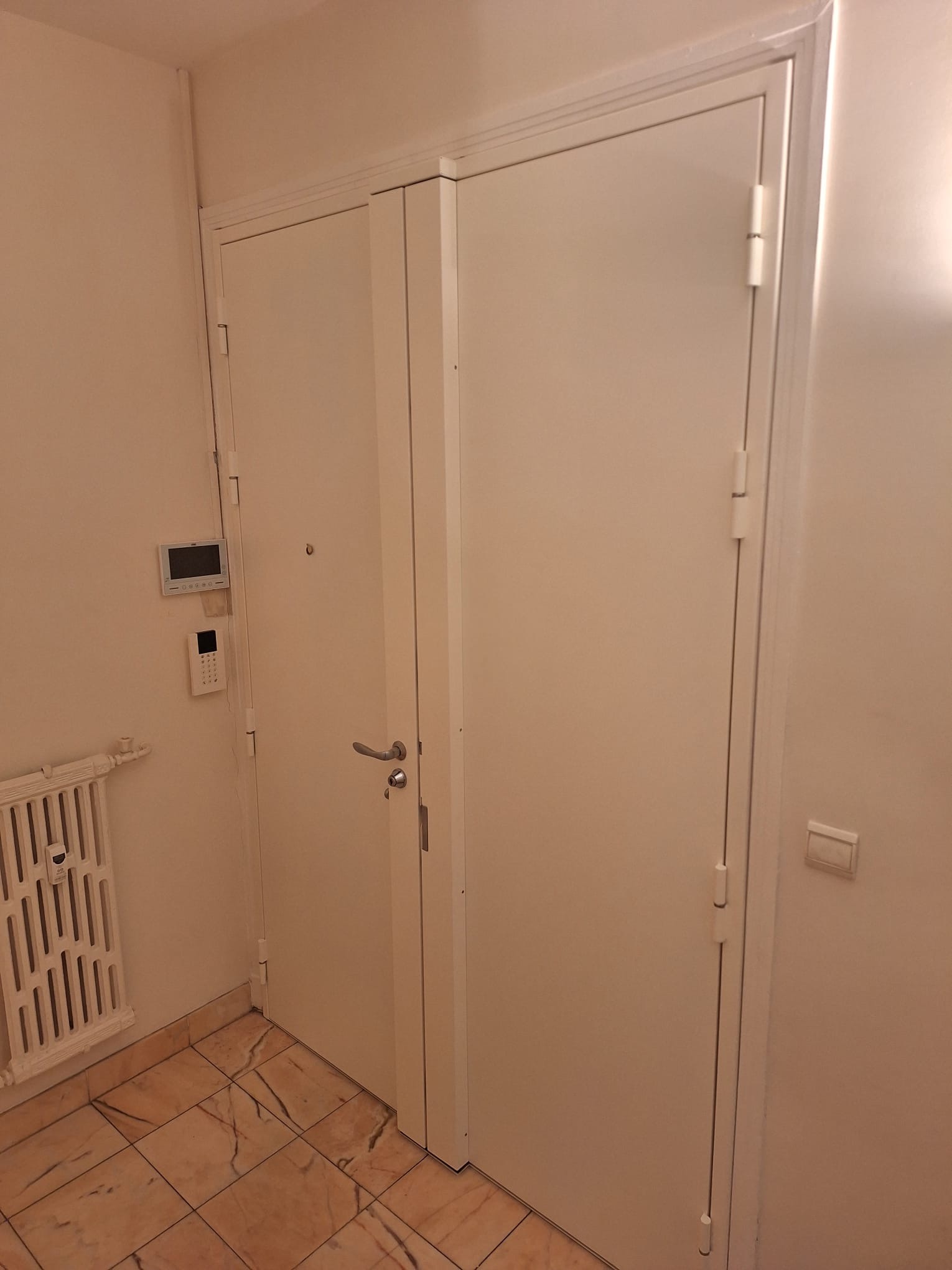 Blindage de porte 2 vantaux à Paris 9 — rue de Clichy — après